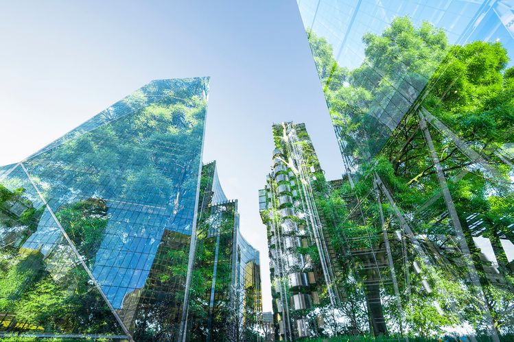 Composite of modern skyscrapers and trees